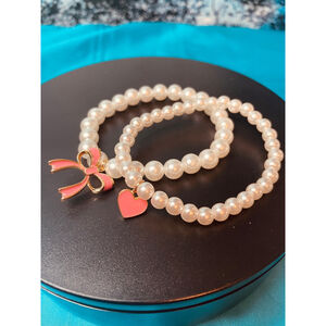 Vivian Westwood Two Stretch Bracelets White Pearls with Pink Heart & Bow Charms